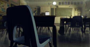 CGI Empty classroom with a single chair during late afternoon video