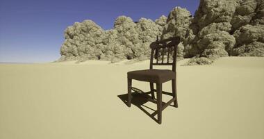 CGI Lonely wooden chair placed in a vast desert landscape under clear sky video