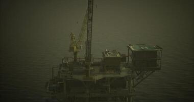 CGI Offshore drilling platform surrounded by calm waters at dusk video