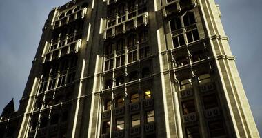 CGI Historic architecture of a tall building reflecting sunlight at dusk video