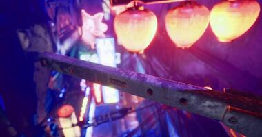 CGI Colorful lanterns illuminate a bustling street in a vibrant market at night video