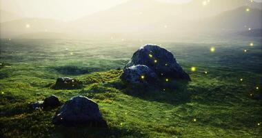 CGI Captivating dawn at a rocky landscape with glowing orbs in the countryside video
