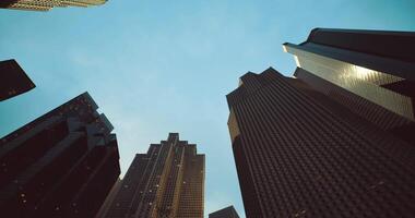 CGI Urban skyline view with towering buildings under a blue sky at dusk video