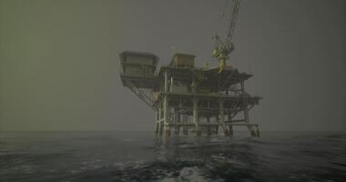 CGI Oil rig at dusk surrounded by calm waters and fog video