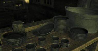 CGI Rustic tableware collection displayed on wooden surface in an old setting video