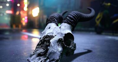 CGI Skull of a ram lies on the ground in an urban setting at night video