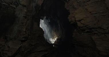 CGI Light streams through an ancient cave formation revealing hidden beauty video