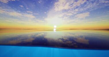 CGI Serene sunset over calm ocean waters with reflection of clouds and sun video