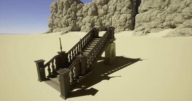 CGI Unique staircase stands alone against rocky backdrop in deserted landscape video