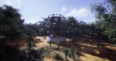 CGI Unique architectural structure amid lush greenery in remote landscape video