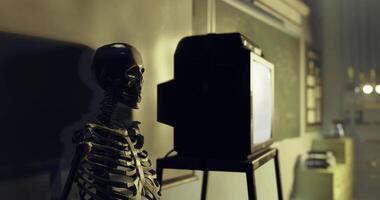 CGI Skeleton stands next to television in an empty classroom setting video