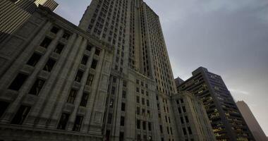 CGI Tall historical building illuminated by evening light in downtown area video