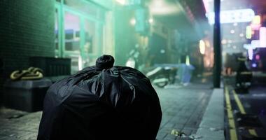CGI Trash bag left on a foggy street corner in urban nightlife environment video