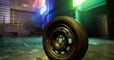 CGI Urban environment with a discarded tire illuminated by neon lights at night video