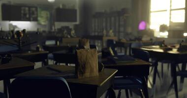 CGI Quiet classroom with empty desks and a brown bag at sunset video