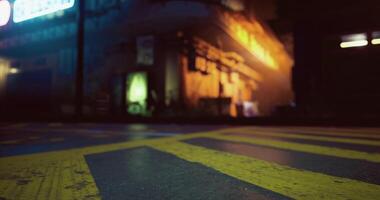 CGI Nighttime street view with neon lights and wet pavement in urban setting video