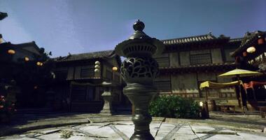 CGI Decorative lanterns illuminate an ancient courtyard in a historic village video