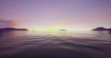CGI Sunset over calm ocean waters with distant islands and soft clouds video