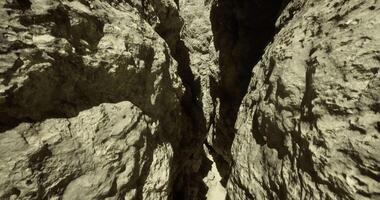 CGI Narrow canyon with rugged rock formations in a desert setting video
