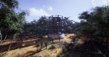 CGI Unique modern structure surrounded by lush green landscape in remote area video