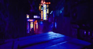 CGI Vibrant neon lights illuminate narrow alleyway at night in urban setting video