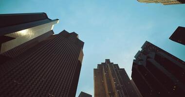 CGI Urban skyline view at dusk revealing towering buildings and clear sky video