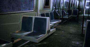 CGI Empty subway train interior highlighting worn seats and dim lighting video