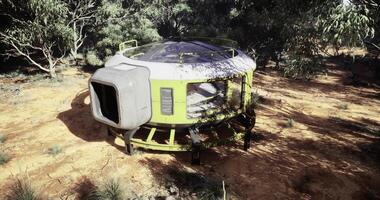 CGI Unique futuristic habitat located in a dense forest setting surrounded by trees video