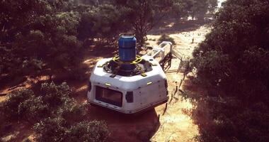 CGI Exploring a futuristic habitat in a remote landscape during daylight video