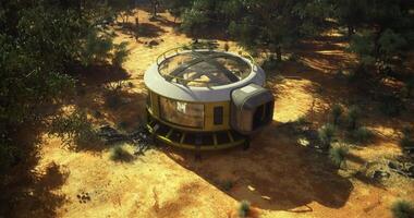 CGI Unique circular dwelling surrounded by desert landscape in bright sunlight video