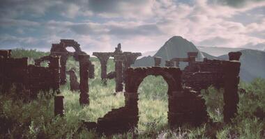 CGI Ancient stone ruins surrounded by lush greenery in a mountainous landscape video