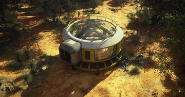 CGI Modern circular structure in desert landscape surrounded by greenery video