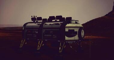 CGI Futuristic habitat module on a desolate extraterrestrial landscape at dusk video