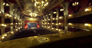 CGI View of an ornate theater interior with chandeliers and plush seating at night video