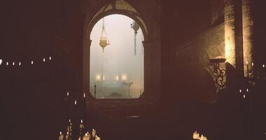 CGI Mysterious light illuminating a stone corridor filled with candles video