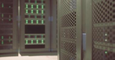 CGI High tech server room with illuminated equipment in a data center environment video