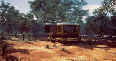 CGI Unique modular habitat in rugged terrain surrounded by lush vegetation video
