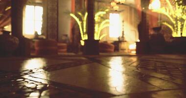 CGI Warmly lit interior with intricate tile design and lush greenery video