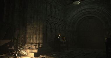CGI Mysterious medieval space illuminated by candlelight in a dark environment video