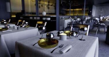 CGI Elegant dining setup in a modern restaurant ready for evening service video