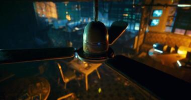 CGI Fan spins above dimly lit cafe during evening hours in a lively atmosphere video