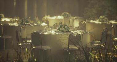 CGI Outdoor event setup with tables and floral arrangements in sunlight video
