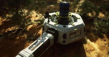 CGI Habitat module on alien landscape with sunlight filtering through trees video