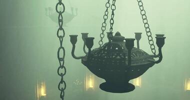 CGI Chandelier hanging in a misty, dimly lit interior of a historic building video