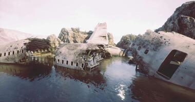 CGI Wreckage of a sunken airplane surrounded by rocky terrain and water video