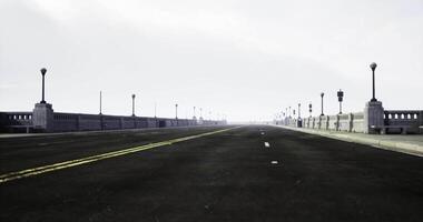 CGI Long empty road leads to distant horizon under cloudy sky video