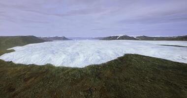 CGI Vast ice sheet covering rugged terrain in a remote northern landscape video