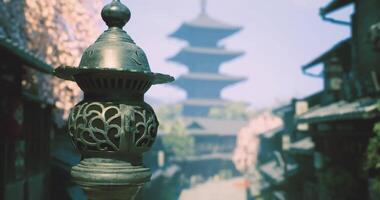 CGI Lantern stands prominently with a pagoda in the background during spring bloom video