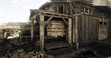 CGI Old wooden structures in an abandoned mining town during the day video