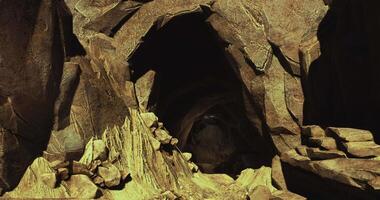 CGI Cave entrance surrounded by rocks and natural formations in a secluded area video